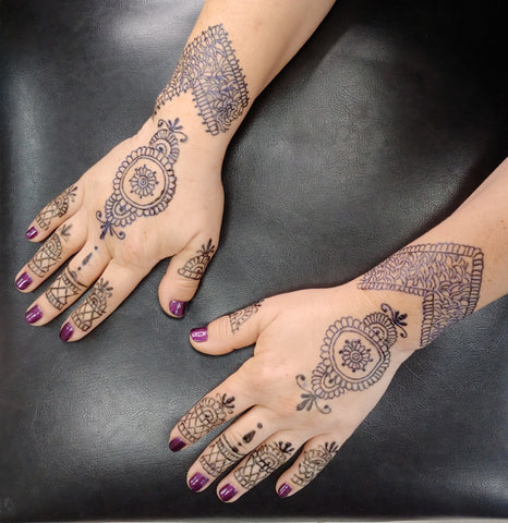 Ornate Matching Henna Hand Tattoos